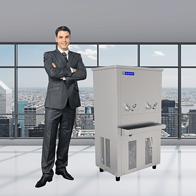 Happy customer in Noida standing next to their newly purchased Blue Star water cooler. Happy customer in Noida standing next to their newly purchased Blue Star water cooler.