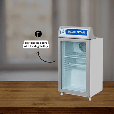 Small glass door refrigerator displaying drinks, Blue Star. Small glass door refrigerator displaying drinks, Blue Star.