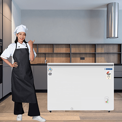 Blue Star CF3-300MEW-SD Freezer in a Restaurant Kitchen with Chefs Blue Star CF3-300MEW-SD Freezer in a Restaurant Kitchen with Chefs
