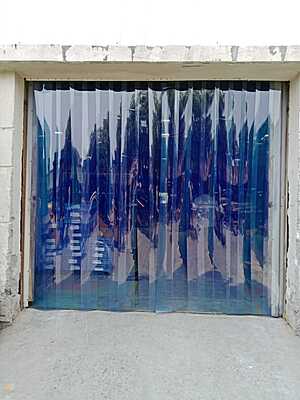 Buzz Lite PVC Strip Curtain installed in a warehouse Buzz Lite PVC Strip Curtain installed in a warehouse