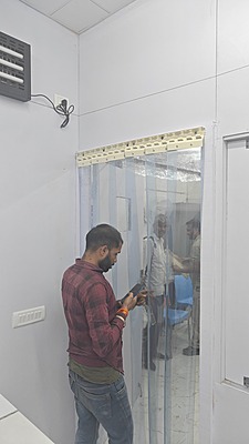 Buzz lite Climate Control Pvc strip curtain a visible door. Buzz lite Climate Control Pvc strip curtain a visible door.