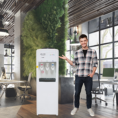 Employees gathering around the Atlantis Frosty Plus water dispenser in an office breakroom.
